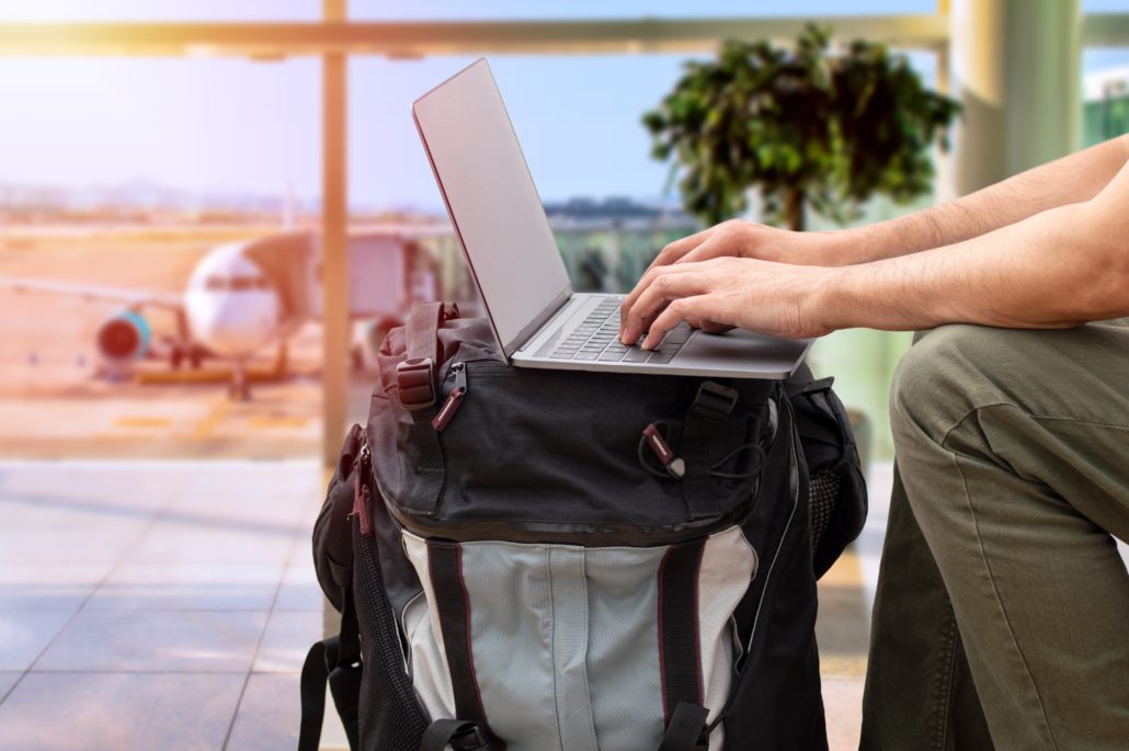 Cropped,Shot,Of,An,Unrecognizable,Digital,Nomad,Sitting,Alone,And